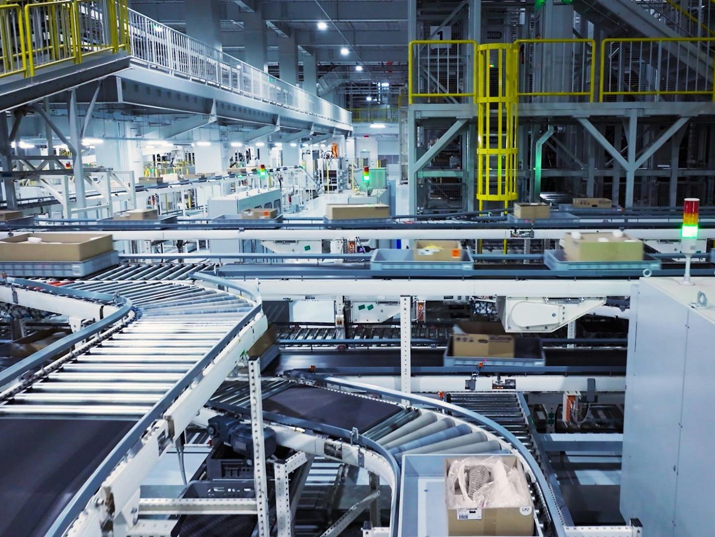 a factory filled with lots of machines and boxes